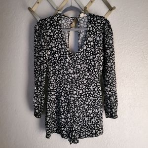 Black + White Romper with open back detail. LA Heart Size L